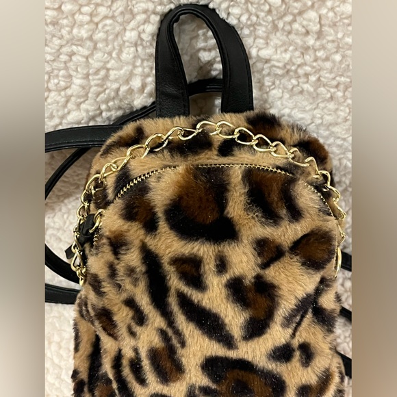 Leopard print faux fur mini backpack/ crossbody purse. Gold-tone hardware. - Picture 3 of 14